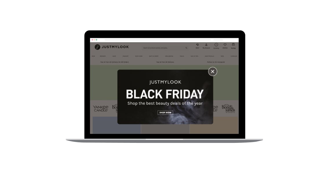 Laptop with black friday banner justmylook